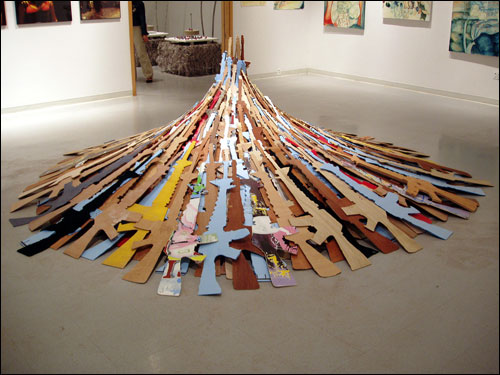 Dave LaMorte, M-16’s, 2005, wood foam cardboard, handmade paper, steel,