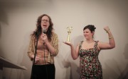 Paddy is forced to announce the award winner for Most Powerful because Powhida fears one losing nominee's wrath. Hethre Contant, our trophy girl, gets pumped. (Photo: Jessica Yatrofsky) Paddy is forced to announce the award winner for Most Powerful because Powhida fears one losing nominee's wrath. Hethre Contant, our trophy girl, gets pumped. (Photo: Jessica Yatrofsky)