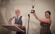 Jack Early, with the assistance of trophy girl Hethre Contant, presents our last, secret award: Best Under Recognized Show, to Rona Yefman at Derek Eller Gallery. (Photo: Jessica Yatrofsky) Jack Early, with the assistance of trophy girl Hethre Contant, presents our last, secret award: Best Under Recognized Show, to Rona Yefman at Derek Eller Gallery. (Photo: Jessica Yatrofsky)
